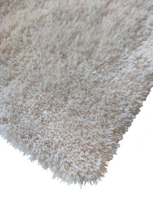 Denna matta heter Midelt Beige Ryamatta i  från 550,00 kr, tillverkad av Polyester material.